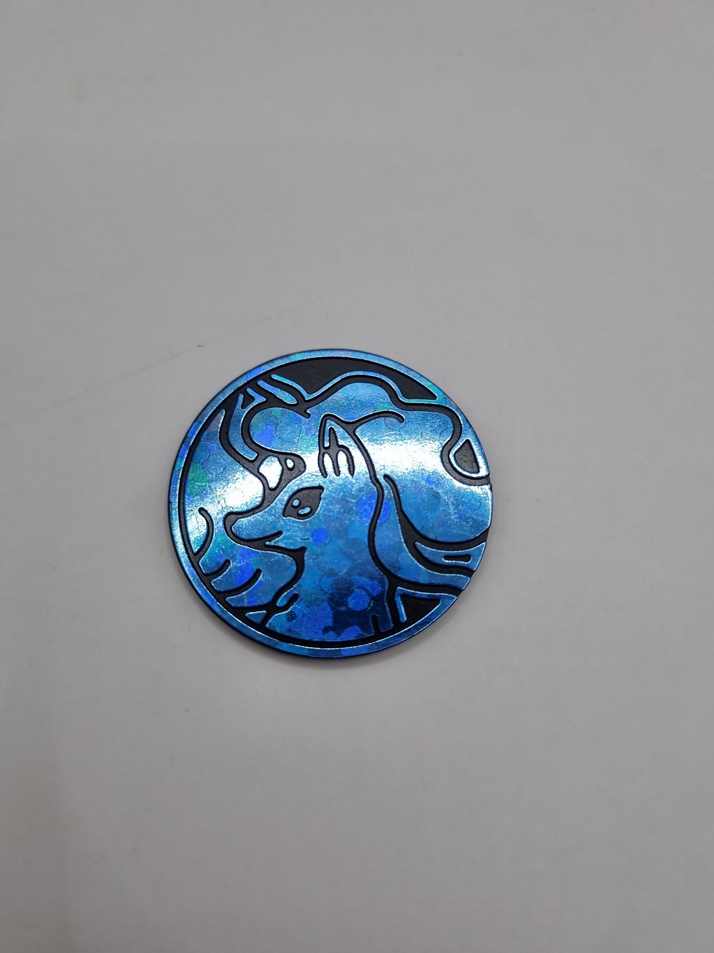 Alolan Ninetales ( Cracked Ice Blue ) Official Pokemon Coin