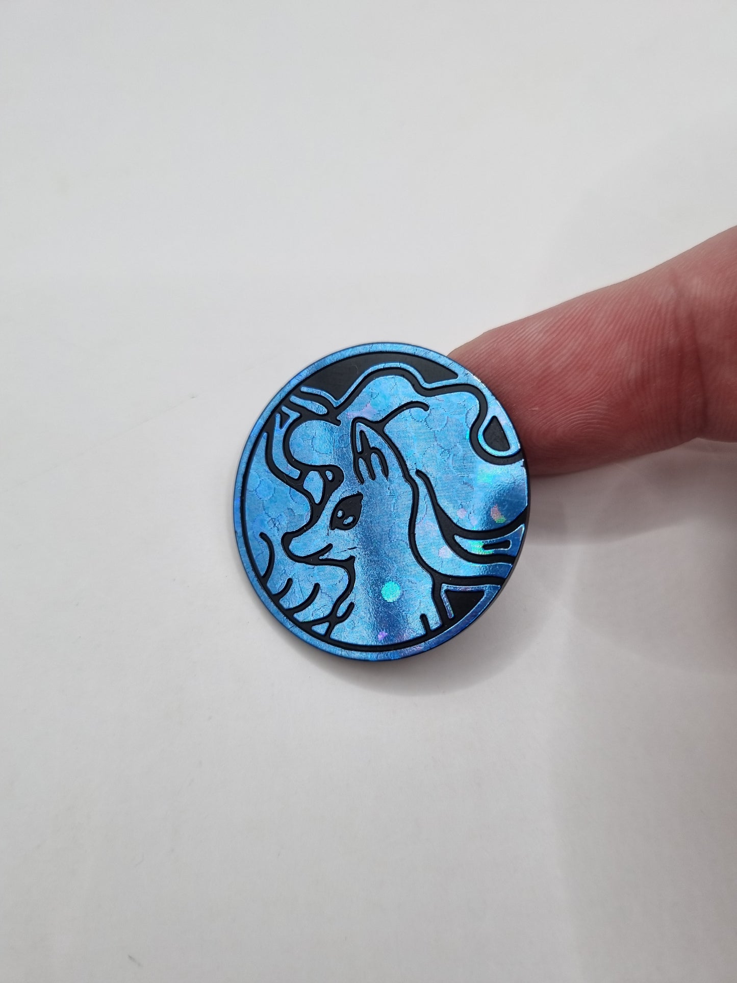 Alolan Ninetales ( Cracked Ice Blue ) Official Pokemon Coin