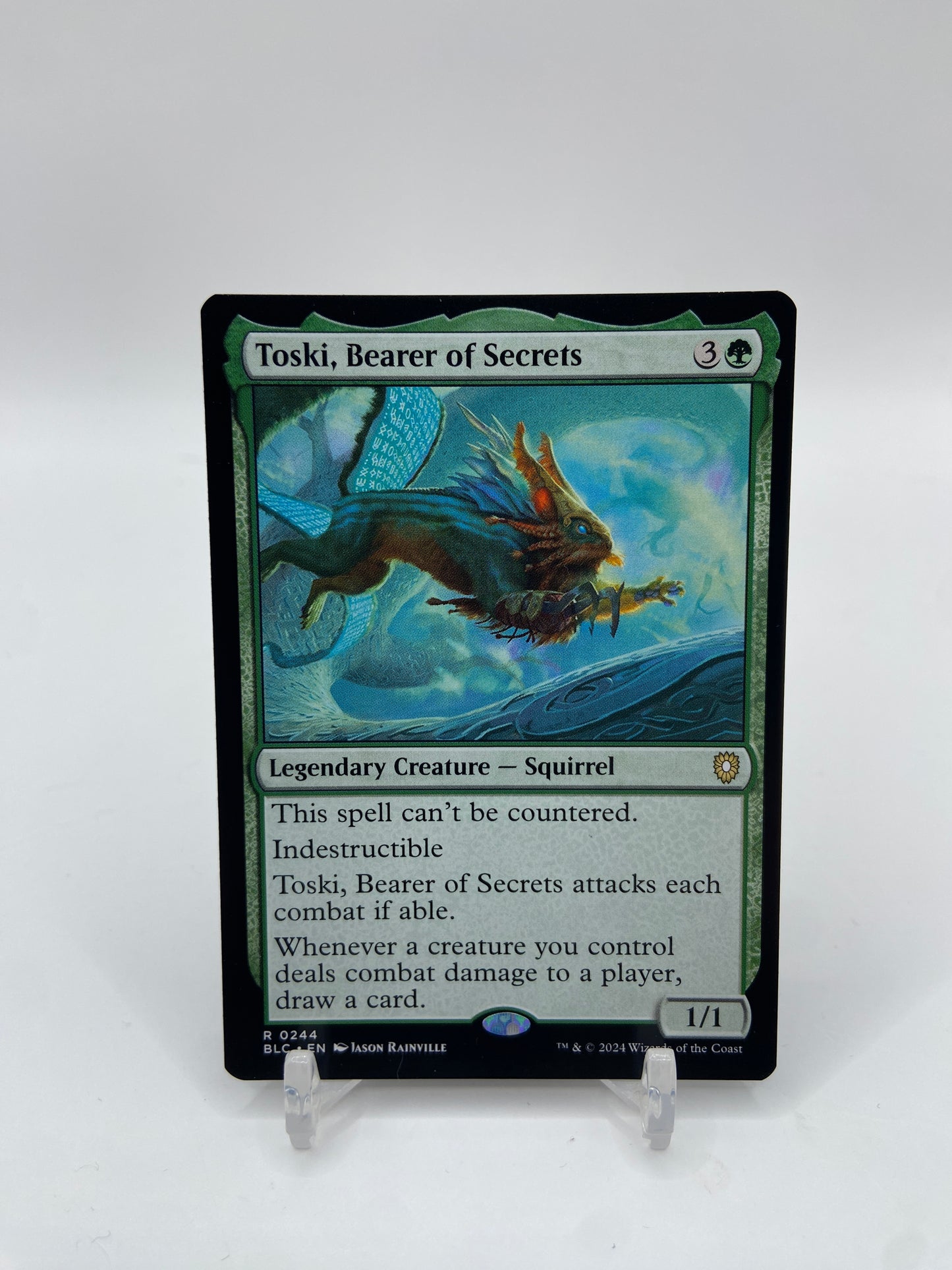 Toski, Bearer of Secrets Commander: Bloomburrow R 244