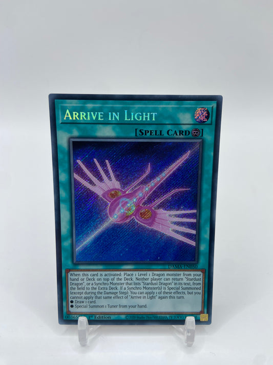 Arrive in Light Secret Rare 1st Edition Dawn of Majesty DAMA-EN050