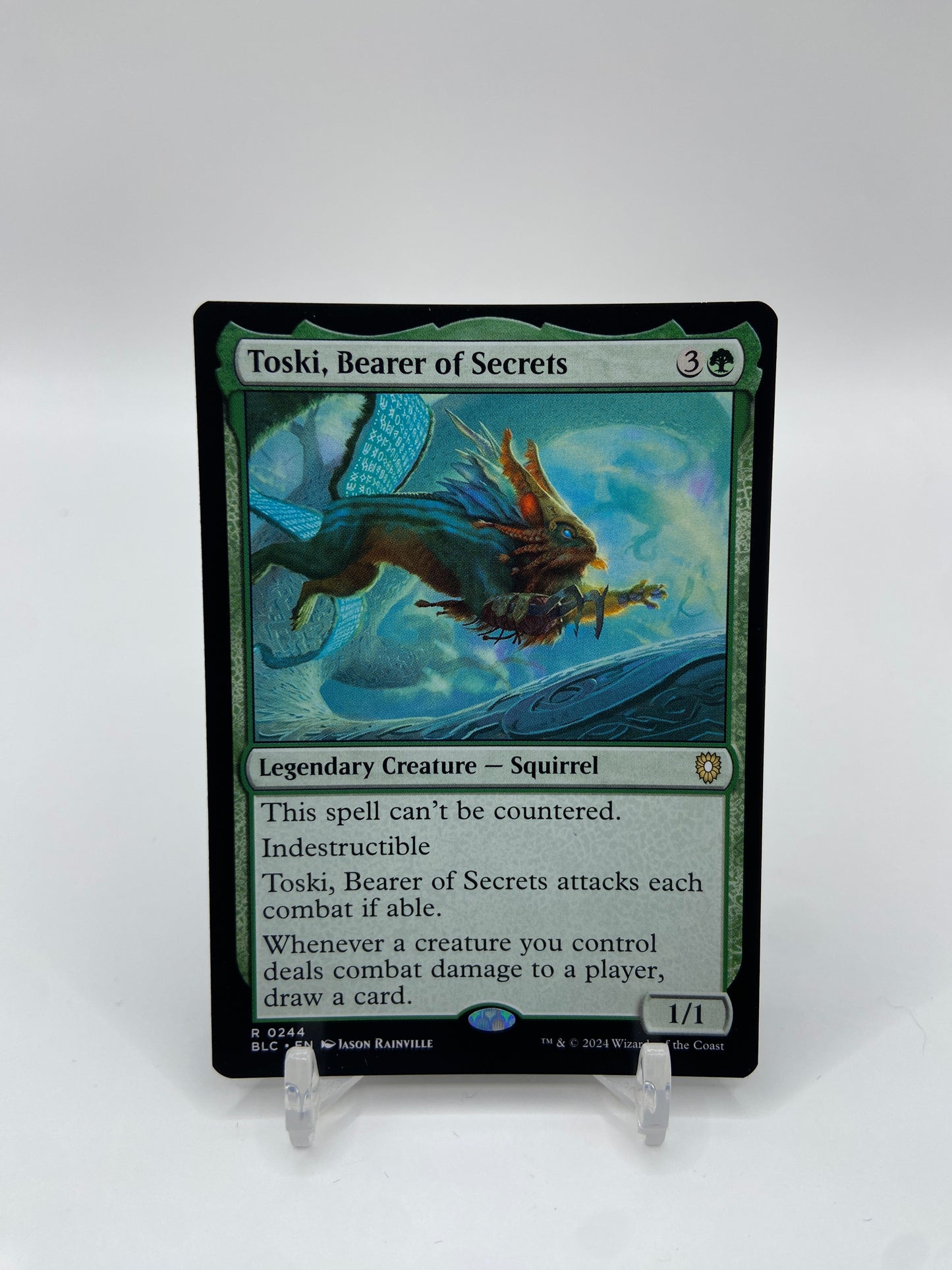 Toski, Bearer of Secrets Commander: Bloomburrow R 244